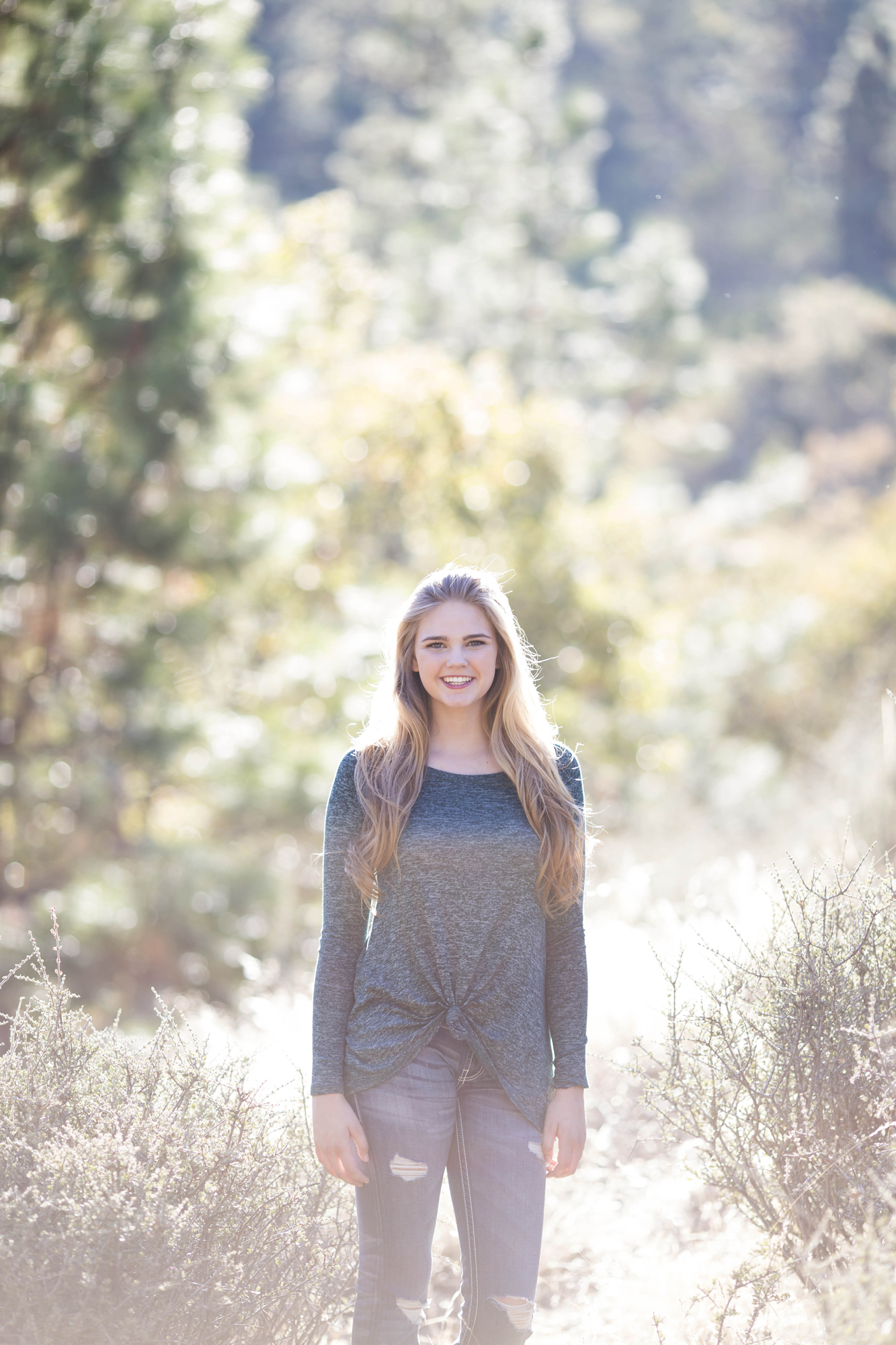 Sunbeams across a high school senior