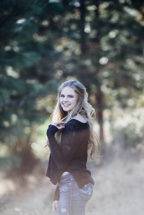 Black blouse and jeans in the outdoors