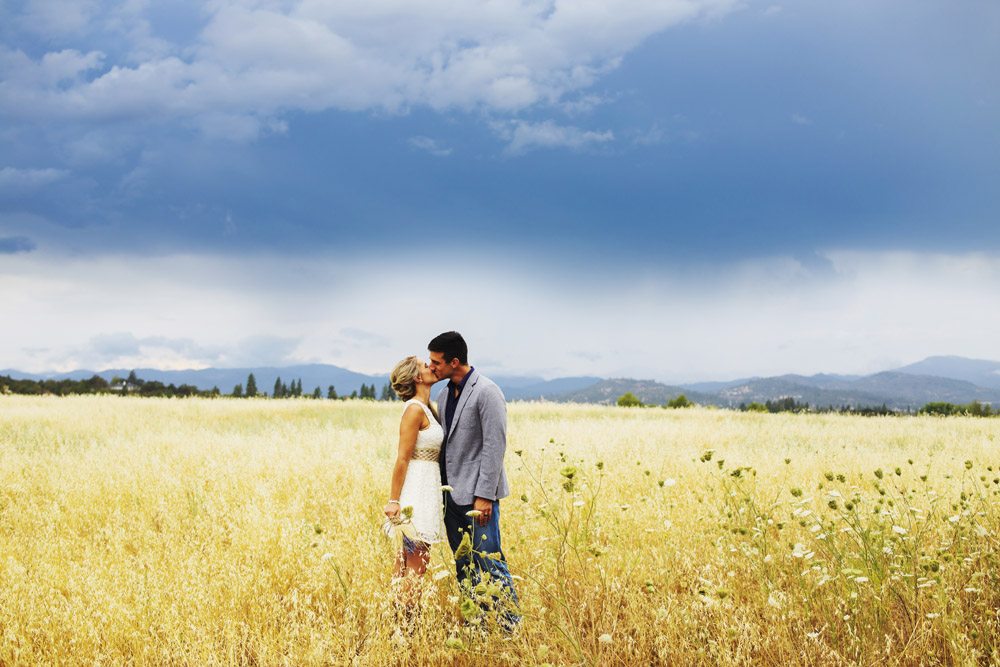 Newlyweds in a country field