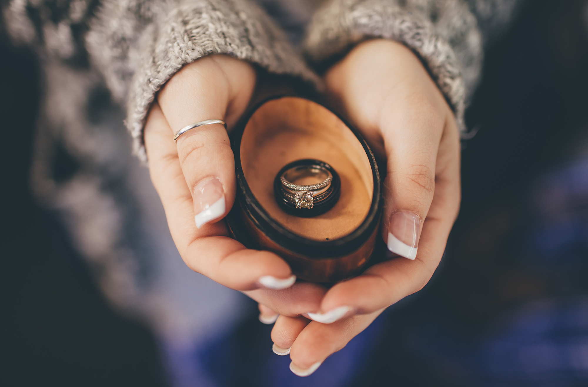 Wedding Rings in Hand